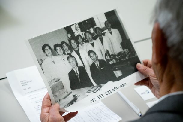 Dr. Urao viewing the photo back then